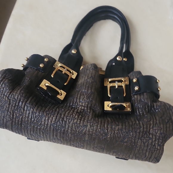 Louis Vuitton Motard Bike bag year 2007 Elegant Black Handbag with Gold Accents - Picture 9 of 10